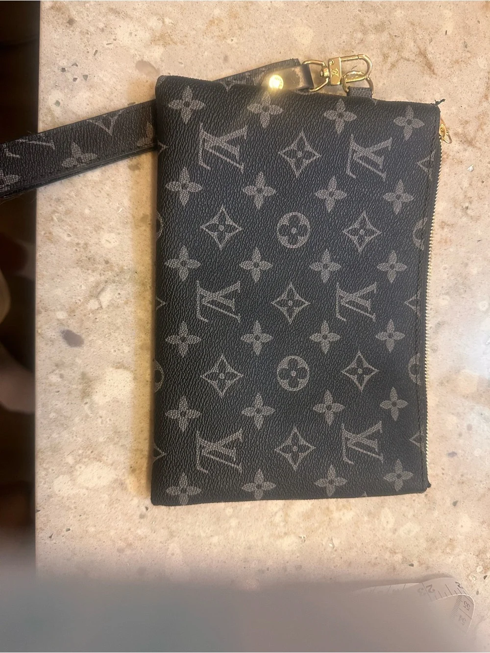 Unlisted sleek wristlet